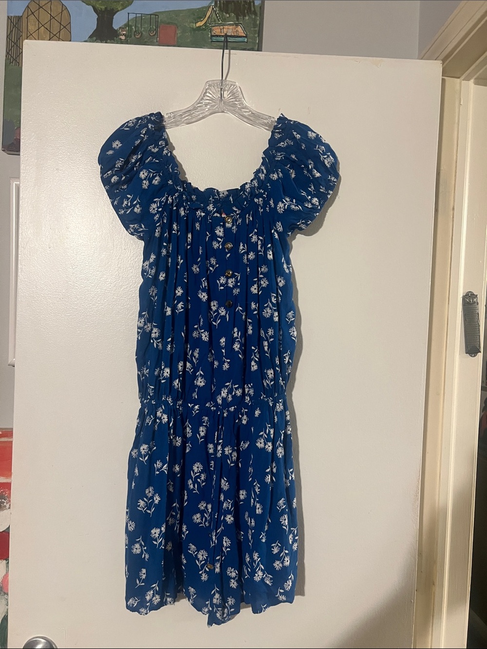 Kate Spade on/off shoulder floral romper. Elastic waist button detail. Pockets